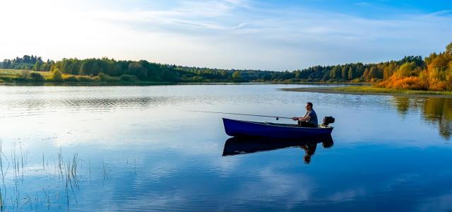 Gentleman Fishing on a Boat